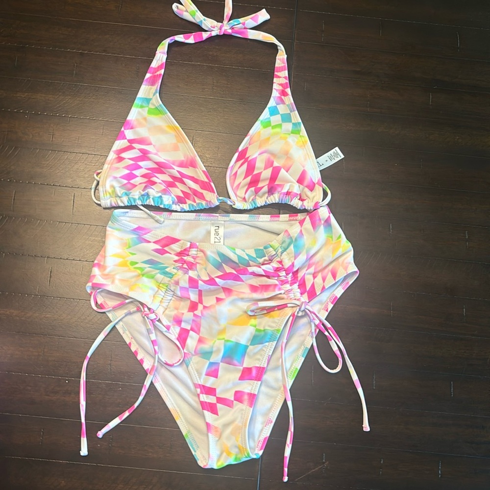 Bikini top and bottoms rainbow coloring, worn maybe once or twice.